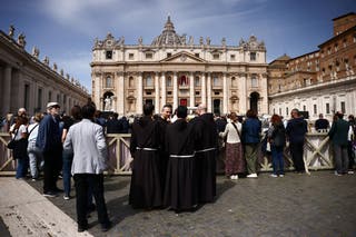 Pope Francis death latest: Tributes pour in after Vatican announces death of head of Catholic church 3 Clergy members stand in St. Peter's Square, after the death of Pope Francis was announced